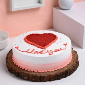 Sweet Scarlet Love Cake with vibrant red layers, creamy frosting, and elegant heart-themed decorations for a romantic celebration.