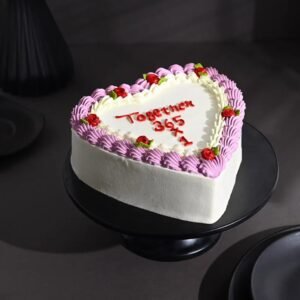 Timeless Love Anniversary Cake with elegant designs, heart-shaped decorations, and rich flavors, perfect for commemorating your enduring love and special moments.