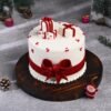 Gift Wrapped Christmas Cake elegantly wrapped in festive decorations, ideal for holiday gifting and celebrations.