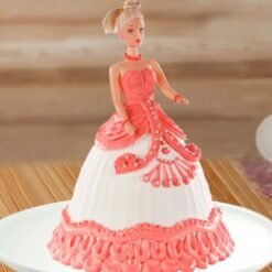 An elegant Orange Barbie Doll Cake featuring a beautifully crafted orange frosting gown.