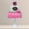 Elegant Barbie Fantasy Cake adorned with soft pink fondant, intricate floral details, and a glamorous Barbie-inspired design.