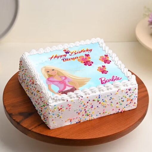 Barbie's Fairytale Cake with a whimsical design, featuring Barbie and pastel colors, topped with smooth creamy frosting for a magical celebration.