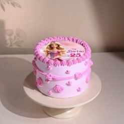 Blush Barbie Glam Cake with elegant Barbie doll and soft pink hues, perfect for a glamorous and chic celebration.