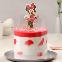 Strawberry Minnie Pull Up Cake with a fun Minnie Mouse design, vibrant pink frosting, and a pull-up surprise of cascading sweetness.