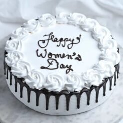 Women’s Day Blackforest Cake with layers of rich chocolate, whipped cream, and cherries, an ideal treat to celebrate women on their special day.