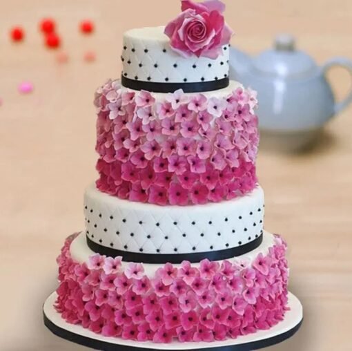 Elegant Floral Tier Cake with cascading floral accents and a refined multi-tiered design, perfect for weddings and special occasions.