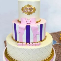 Ribboned Joy Tier Cake with elegant ribbon decorations and layered perfection, perfect for joyous celebrations.