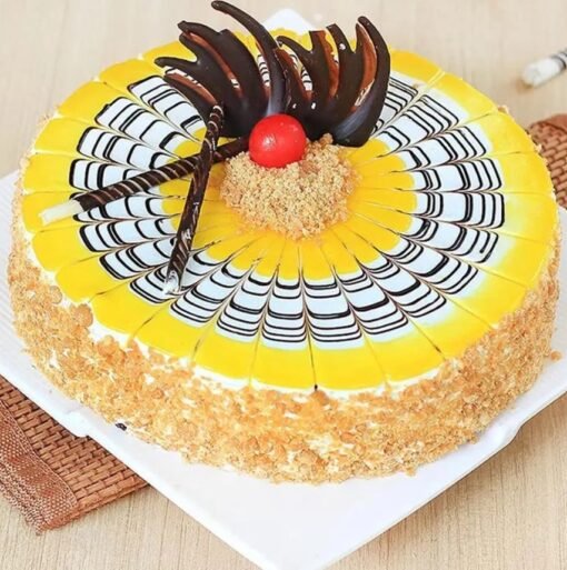 Choco Butterscotch Swirls Cake with creamy chocolate frosting, butterscotch swirls, and a delectable topping of crunchy caramel pieces.