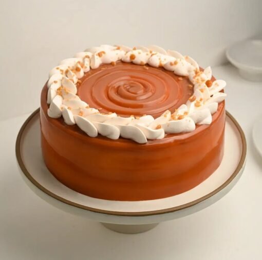 Elegant Butterscotch Love Affair Cake with caramel swirls and a creamy butterscotch base, perfect for romantic celebrations.