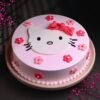 Charming Hello Kitty-themed cake with pastel colors, intricate decorations, and a cute design ideal for birthday celebrations.