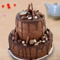 Chocolate Elegance Tier Cake featuring multiple layers of rich, velvety chocolate with elegant decoration, perfect for sophisticated events.