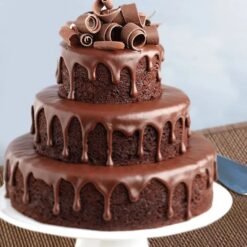 Dripping Chocolate Tier Cake with rich chocolate glaze cascading down, designed for chocolate lovers and special events.