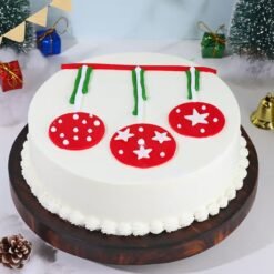 Merry Christmas Celebration Cake featuring holiday-themed decorations like Santa, Christmas trees, and snowflakes.