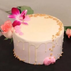 Graceful Butterscotch Cake with smooth caramel glaze and delicate frosting, ideal for classy celebrations.