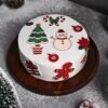 Festive Delight Christmas Cake featuring red, green, and gold decorations with a merry holiday theme, ideal for Christmas celebrations.