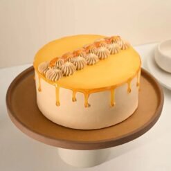 Golden Love Butterscotch Cake adorned with caramel drizzle and golden accents, perfect for memorable occasions.