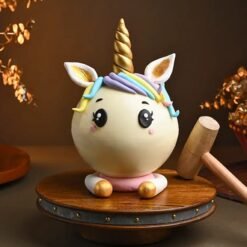 Unicorn Pinata Butterscotch Cake featuring a vibrant unicorn design, filled with a delightful surprise and rich butterscotch flavor.