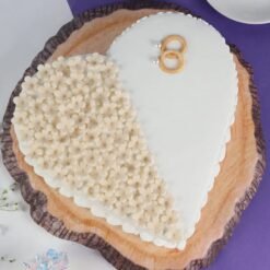 Rings Heart Cake featuring a heart-shaped design with ring decoration, perfect for romantic celebrations or special moments.