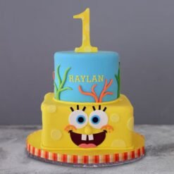 SpongeBob First Birthday Cake featuring bright colors, playful ocean elements, and a happy SpongeBob topper.