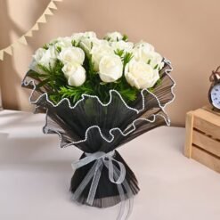 Snowy Roses Bouquet of pristine white roses, symbolizing purity and timeless love, ideal for weddings, anniversaries, or heartfelt tributes.