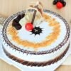 Timeless Butterscotch Cake featuring layers of rich butterscotch cream and a velvety texture, garnished to perfection.