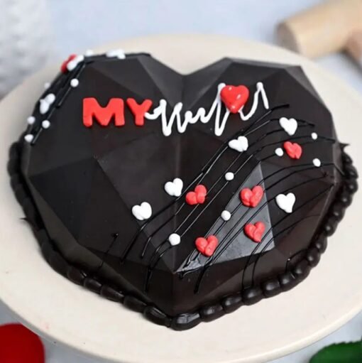 My Heartbeat Pinata Cake with a heart-shaped design, decorated with love-themed details and filled with candies, perfect for romantic occasions.