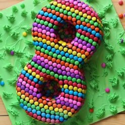 Number Eight Cake decorated with vibrant edible gems, rich frosting, and a fun, festive design for a special birthday celebration.