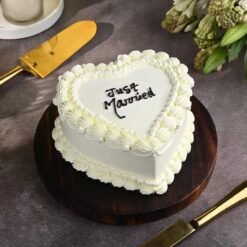 Elegant Newlywed Bliss Cake with delicate decorations, symbolizing love, joy, and the start of a beautiful journey together.