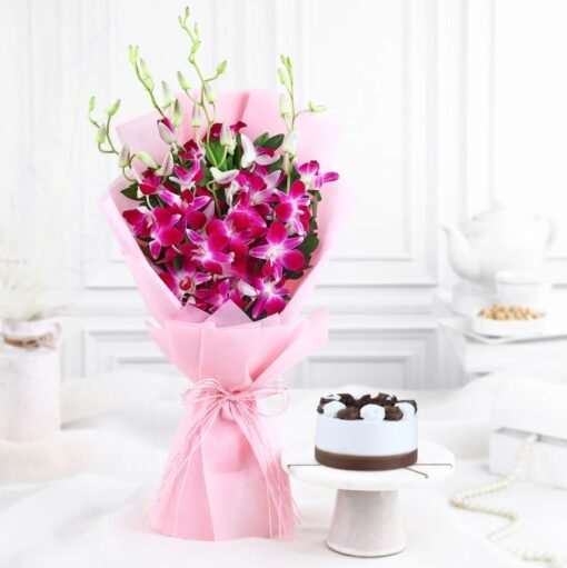 Black Forest Orchid Celestial Combo featuring a delicious black forest cake and stunning orchids, ideal for celebrating memorable moments.