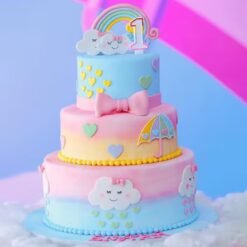 Unicorn Fantasy Tier Cake with pastel colors, sparkles, and a whimsical unicorn topper for a magical celebration.