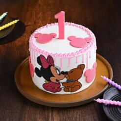 Minnie Mouse-themed cake with vibrant decorations, ideal for magical birthday celebrations and parties.