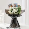 Magnetic Petals Bouquet, a stunning floral arrangement of vibrant blooms that captivate and bring warmth to any space or occasion.