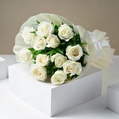 Pearly White Rose Bouquet showcasing pure white roses, symbolizing grace, respect, and eternal love, ideal for weddings, anniversaries, or heartfelt tributes.