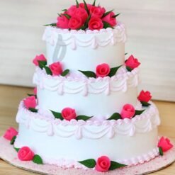 Happily Ever After Tier Cake with elegant floral accents, delicate fondant details, and a graceful multi-layered design.