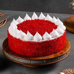 Crimson Elegance Cake with deep red layers and elegant cream cheese frosting, offering a rich, velvety texture and refined appearance.