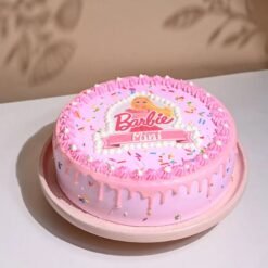 Rosette Barbie Dream Cake decorated with soft pink rosettes, elegant Barbie-inspired accents, and a touch of fantasy for any celebration.