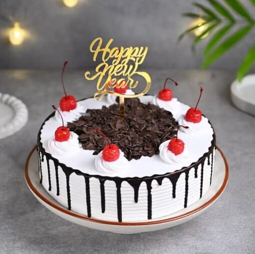 Black Forest New Year Cake with chocolate layers, whipped cream, and cherries, perfect for adding sweetness to New Year celebrations.