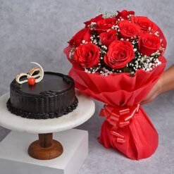 Luxurious chocolate truffle cake paired with elegant roses, perfect for celebrations and gifting.