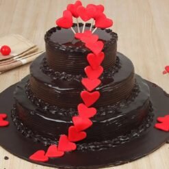 Valentine Truffle Tier Cake with chocolate layers, truffle accents, and romantic decorations, perfect for Valentine's Day.