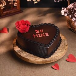 Be Mine Choco Bliss Cake with luscious chocolate layers and heart-themed decorations for a romantic treat.