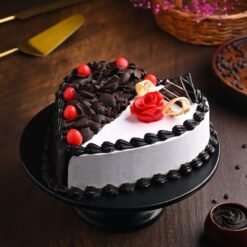 Elegant Divine Duo Heart Cake with two intertwined hearts, rich flavors, and smooth frosting.